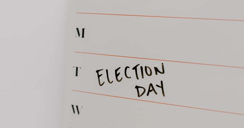 Image of a calendar that reads "election day", U.S. voters support climate action | Climate Nexus Polls