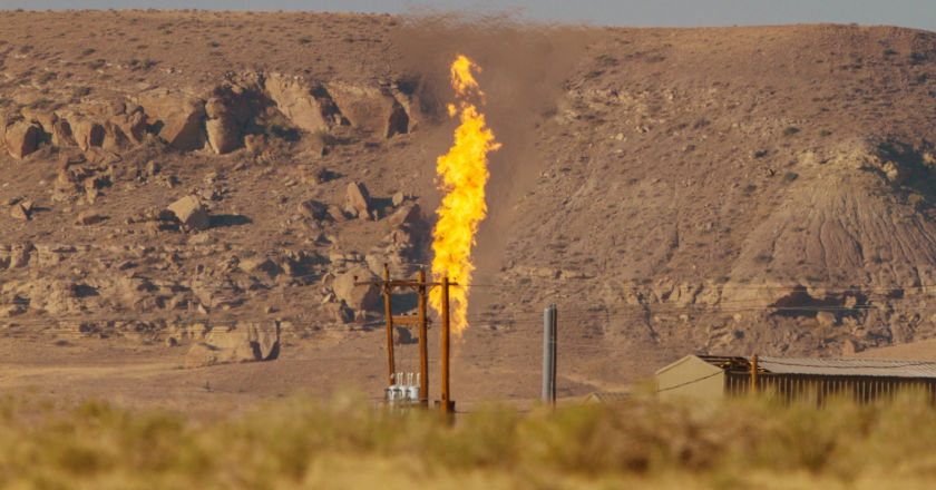 Image of Methane burning at a flare stack in rural America adds a harmful greenhouse gas to the atmosphere